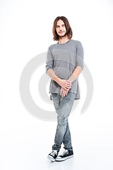 Full lenght of handsome young man with long hair