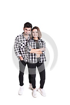 Full lenght happy young couple portrait isolated on white