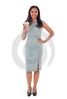 Full lenght portrait of happy smiling young asian woman holding takeaway paper coffee cup isolated over white background