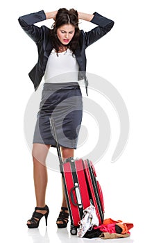 Full lengt business woman to late red travel bag