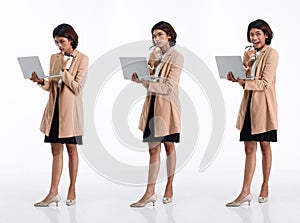 Full length 20s young Asian Business Woman businesswoman wear blazer skirt, thinking work hard