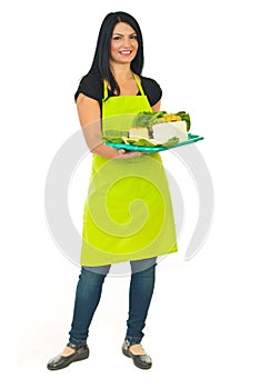 Full length of attractive cheese maker female photo