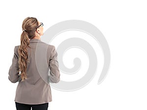 Full-length back side of businesswoman, isolated on white.