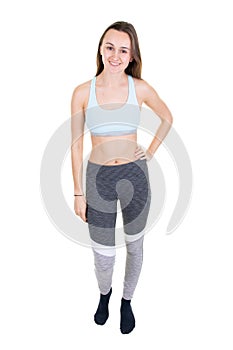 Full length beautiful fitness woman with perfect body wearing sport clothes for gym training girl