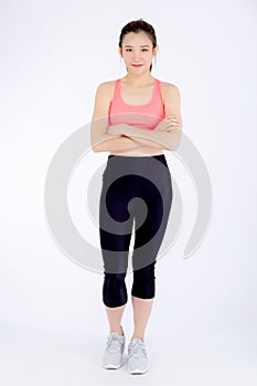 Full-length beautiful portrait young asian woman in sport clothing with satisfied and confident isolated