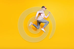 Full length body size photo blonde woman jumping running on sale isolated vibrant yellow color background