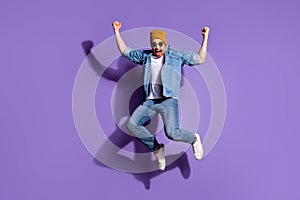 Full length body size photo of cheerful crazy positive strong screaming shouting man with ecstatic facial expression