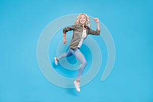 Full length body size photo happy woman jumping up running on sale isolated pastel blue color background