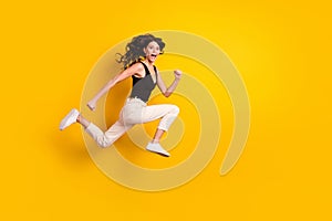 Full length body size side profile photo of woman jumping running cheerfully on sale  vivid yellow color