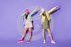 Full length body size view of nice attractive pretty fashionable slim fit girls showing dab gesture move modern dancing