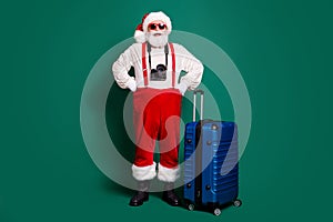 Full length body size view of nice handsome bearded funky cheerful cheery overweight fat Santa boarding air flight fly
