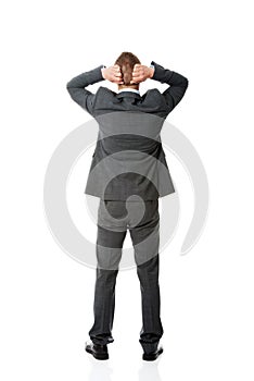 Full length businessman putting hands on the nape