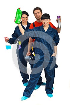 Full length of cleaning workers teamwork