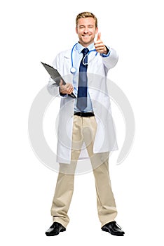 Full length of confident young doctor on white background