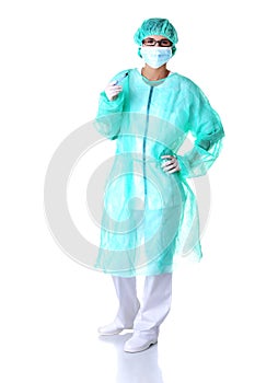Full length female doctor with a scalpel