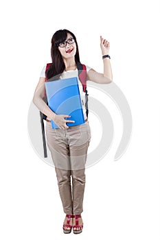 Full length of female student getting idea