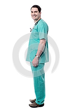 Full length happy male physician.