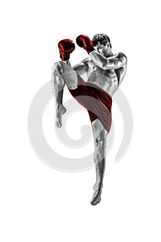 Full length of kickboxer in red sportswear who fighting on white background. Black and white