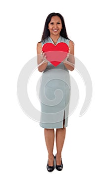 Full length of mixed race happy asian/caucasian woman hold Love symbol red heart. Isolated on white background female model