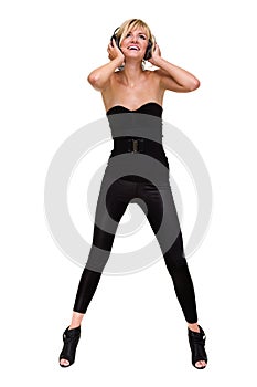 Full length photo of attractive woman dancer with headphones, isolated on white