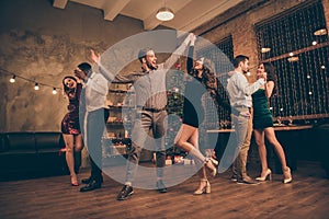 Full length photo of cheerful lover dance have christmas time x-mas party in house with newyear lights indoors