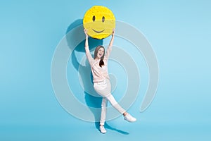 Full length photo of happy cheerful nice young woman big smile emoji raise above head isolated blue color background