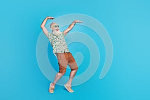 Full length photo of old positive senior granddad boss successful staying tiptoe wear sunglass look empty space advert