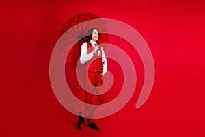 Full length photo of optimistic mister boyfriend wearing formal glamour outfit under parasol look occasion isolated on