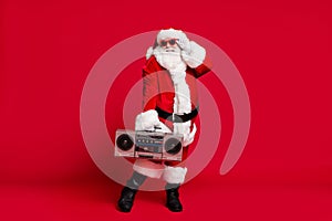 Full length photo of pensioner old man grey beard funny posing hold glasses boom box wear santa costume gloves coat belt