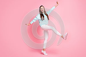 Full length photo of pretty person have great weekend hands fly cheerful smile  on pink color background