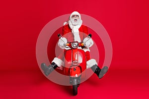 Full length photo of retired grandfather white beard mad ride retro moped open mouth spread legs fast ride down hill