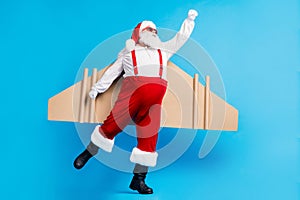 Full length photo of stylish modern white grey hair bearded santa claus fly craft wings 0on x-mas christmas time noel