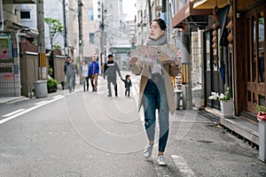 Full length photo of traveler walking on street