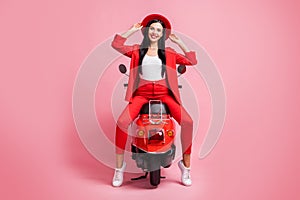 Full length photo of young attractive girl happy positive smile wear sunhat travel sit motorbike isolated over pastel
