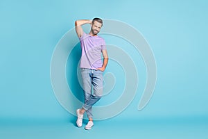 Full length photo of young handsome man happy smile confident successful isolated over blue color background