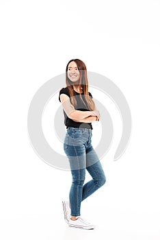 Full length photo of young pretty chinese woman in black tshirt
