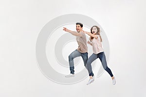 Full-length picture of couple man and woman with excitement on f