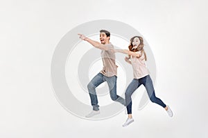 Full-length picture of delighted couple man and woman in casual