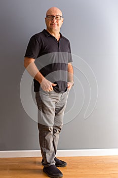 Full length portrait of adult bold man