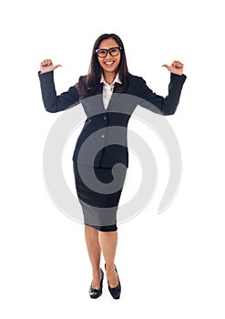 Full length portrait of beautiful asian business woman in glasses showing ok gesture with thumbs up isolated on white background
