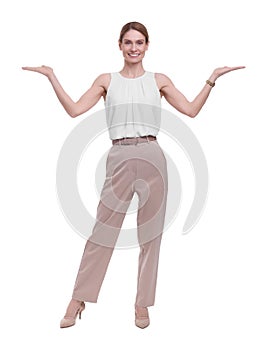 Full length portrait of beautiful happy businesswoman welcoming on white background