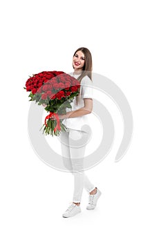 Full length portrait of beautiful woman with bouquet of roses on white