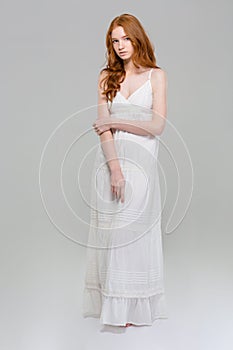 Full length portrait of a beautiful woman in dress