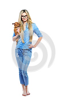Full length portrait of a beautiful woman with her little puppy