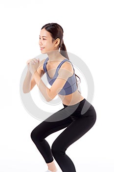 Full length portrait beautiful young asian woman in sportswear practicing doing squats for bodybuilder isolated.