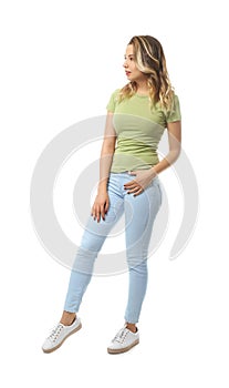 Full-length portrait of beautiful young woman on white background