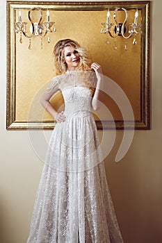 Full length portrait of beauty bride in white dress. Classic sty