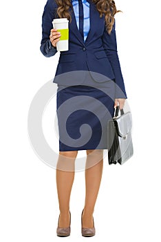 Full length portrait of business woman with briefcase and cofee