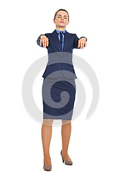 Full length portrait of business woman walking like zombie