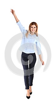 Full length portrait of businesswoman balancing